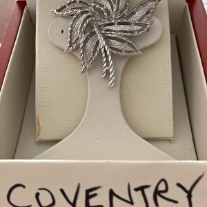 Signed Sarah Coventry Canada silver brooch.